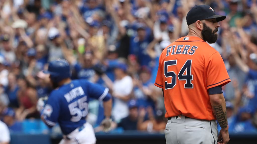Mike Fiers was out of Sunday's game after allowing Russell Martin's homer in the fifth. (AP)