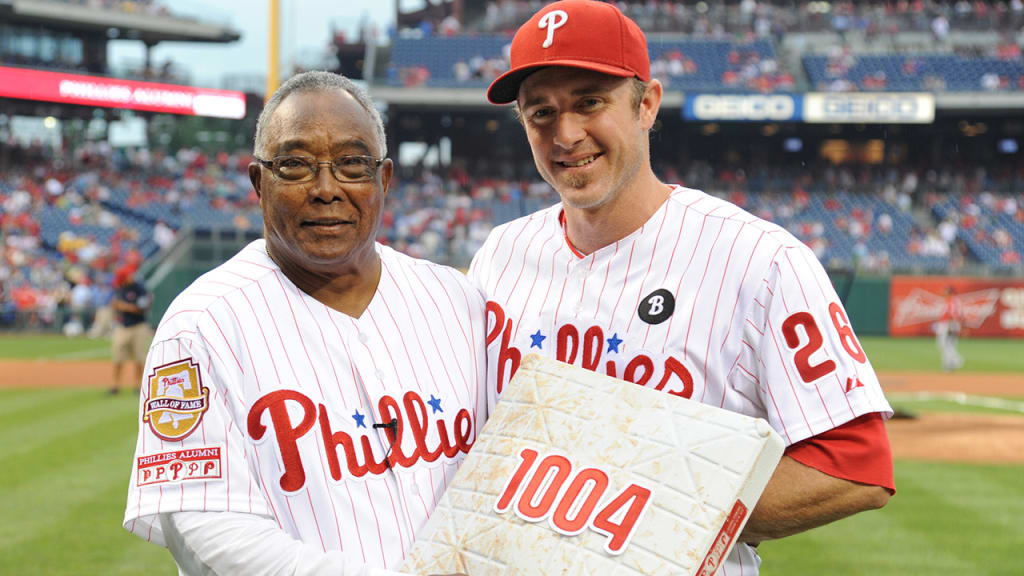 Tony Taylor (left) and Chase Utley pose together after Utley passed Taylor for most games played by a Phils 2B. (Phillies)