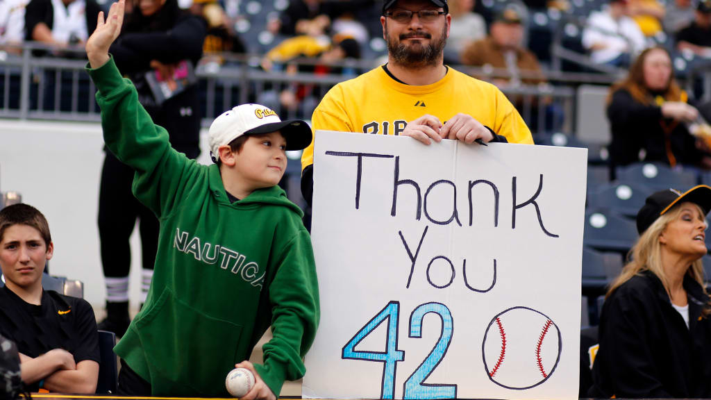 ST. LOUIS, MO - APRIL 15: The Pittsburgh Pirate infield and catcher come  together to celebrate their victory during the Jackie Robinson Day game  between the Pittsburgh Pirates and the St. Louis