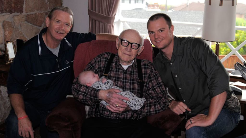 John, Rex and Jon Lester pose for a photo, with Jon's son Hudson being held in the middle. (Jon Lester)