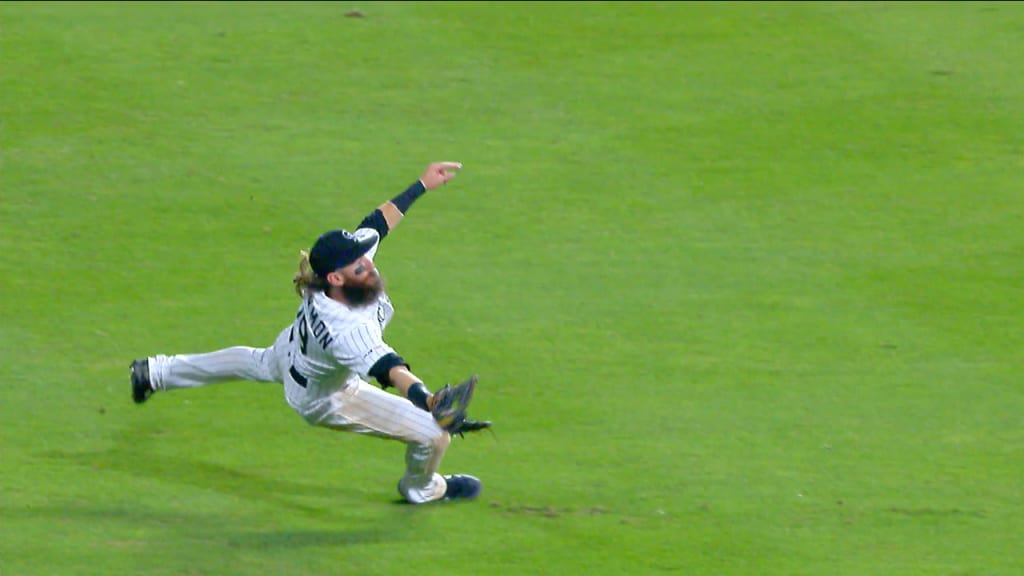 Rockies' Raimel Tapia robs the Marlins' Lewis Brinson of a home