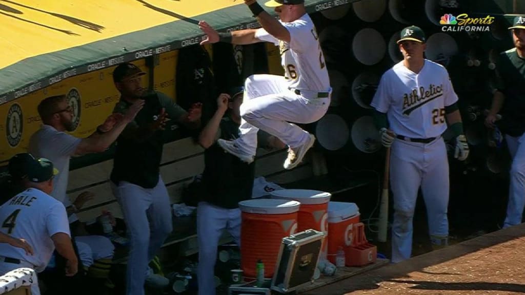 Matt Chapman hurdled Gatorade jugs and landed in the dugout after a great  running catch