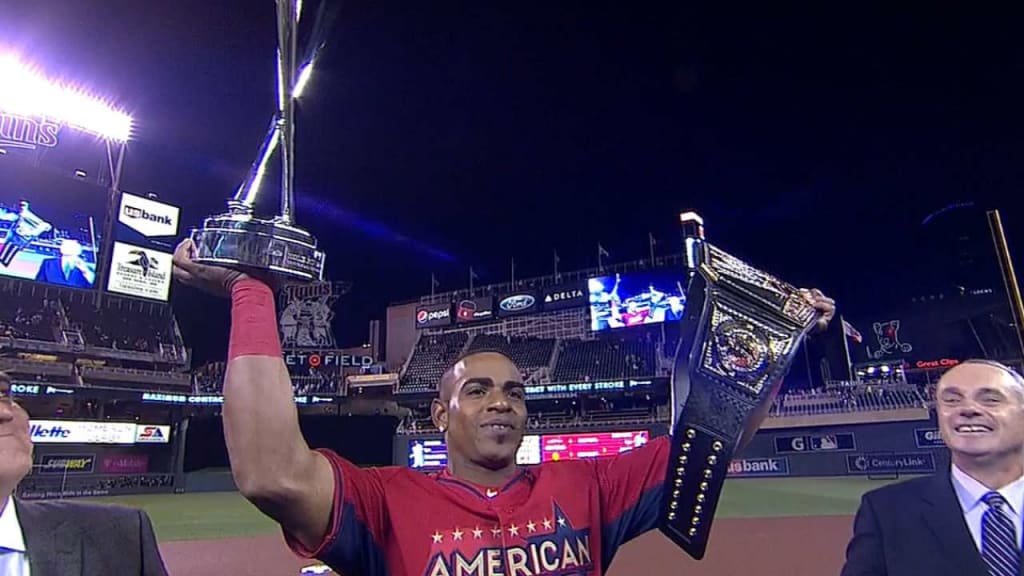 Oakland A's Yoenis Cespedes holds the championship trophy after winning the  Chevrolet Home Run Derby on the eve of the 84th MLB All-Star Game at Citi  Field in New York City on