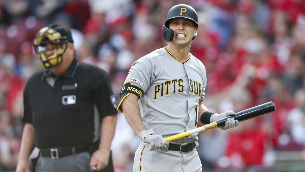 Pittsburgh Pirates left fielder Corey Dickerson, right, holds his