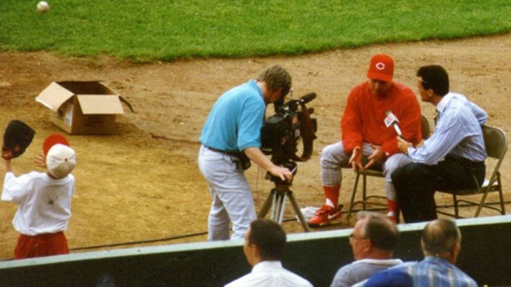 Drew Storen (left) shadowed his father Mark (right), often commiserating with Reds players such as Aaron Boone. (Mark Storen)