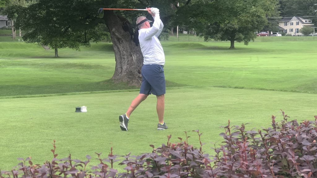 Tom Glavine tees off during Saturday's Hall of Fame golf outing in Cooperstown, N.Y. (MLB.com)