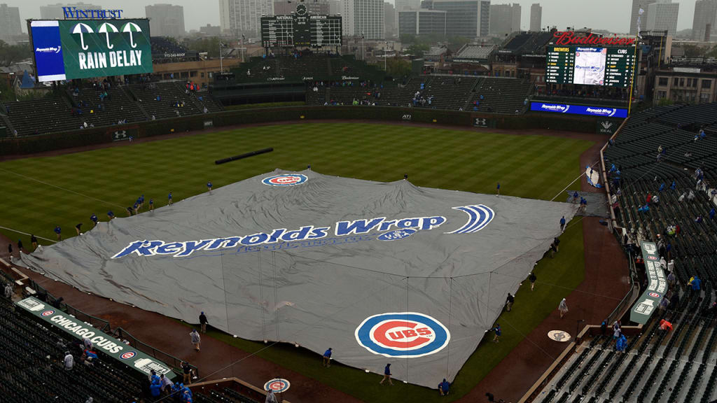 The series opener between Milwaukee and Chicago was delayed by rain in the sixth inning. (AP)