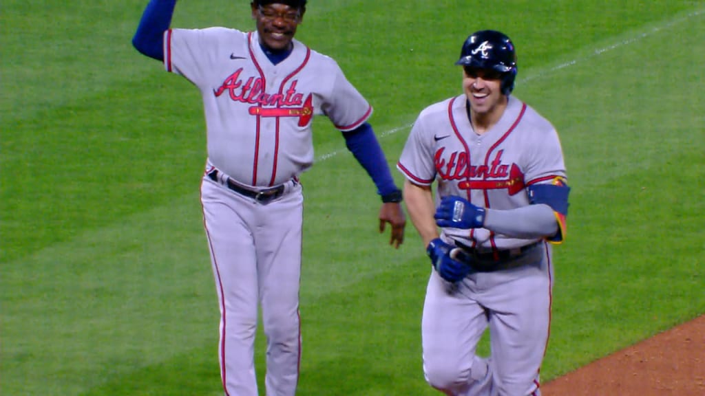 Braves bats erupt in extra innings win over Rockies