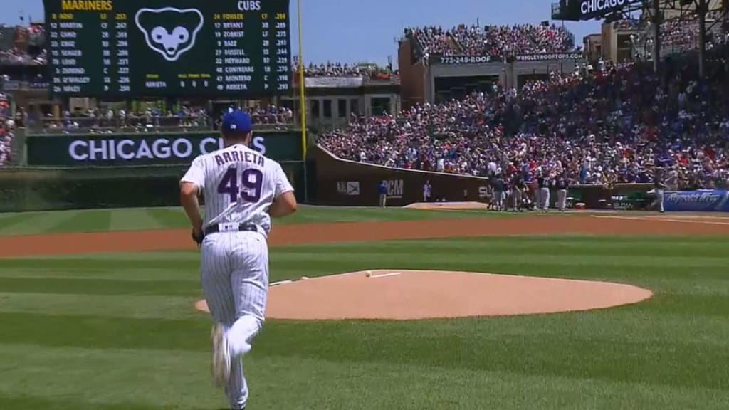 Martin's 2-run double off Chapman leads M's over Cubs 4-1