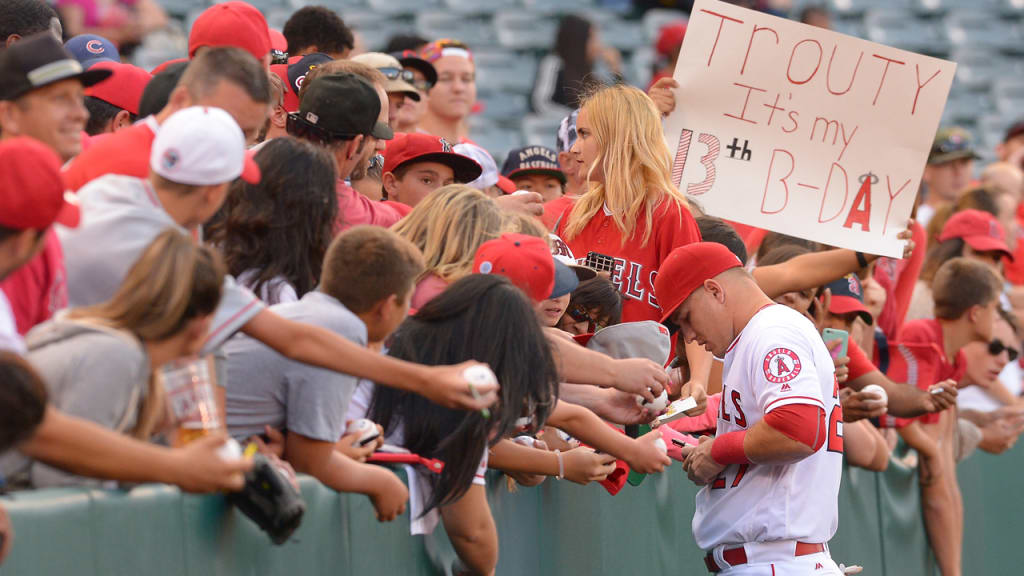 Mike Trout signs autographs before a game at Angel Stadium. (Jayne Kamin-Oncea/Getty Images)