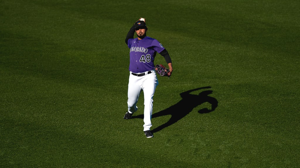 Germán Márquez throws during the Rockies' first day of workouts.