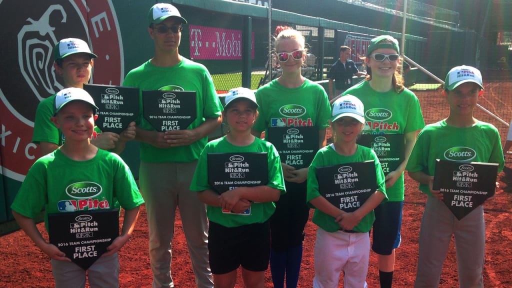 Winners of Sunday's Pitch, Hit & Run competition at Nationals Park pose with their awards. (MLB.com)