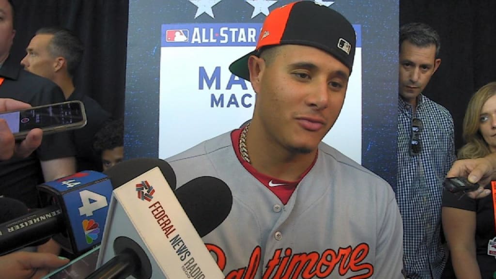 San Diego Padres shortstop Manny Machado signs autographs before a