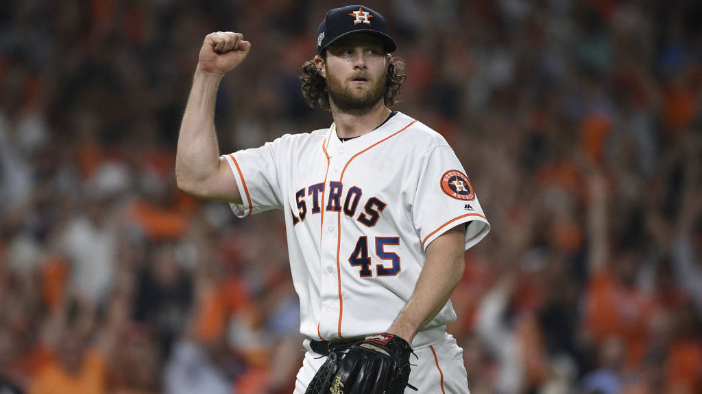 Pitcher Gerrit Cole of the Pittsburgh Pirates rests on the bench