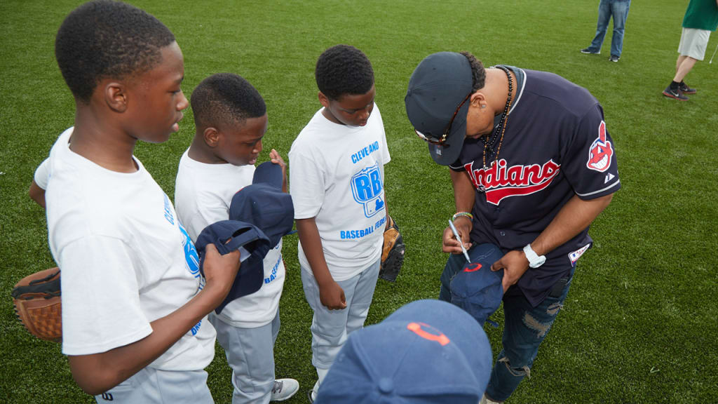 Francisco Lindor signs autographs for some of Thursday's clinic participants. (Indians)