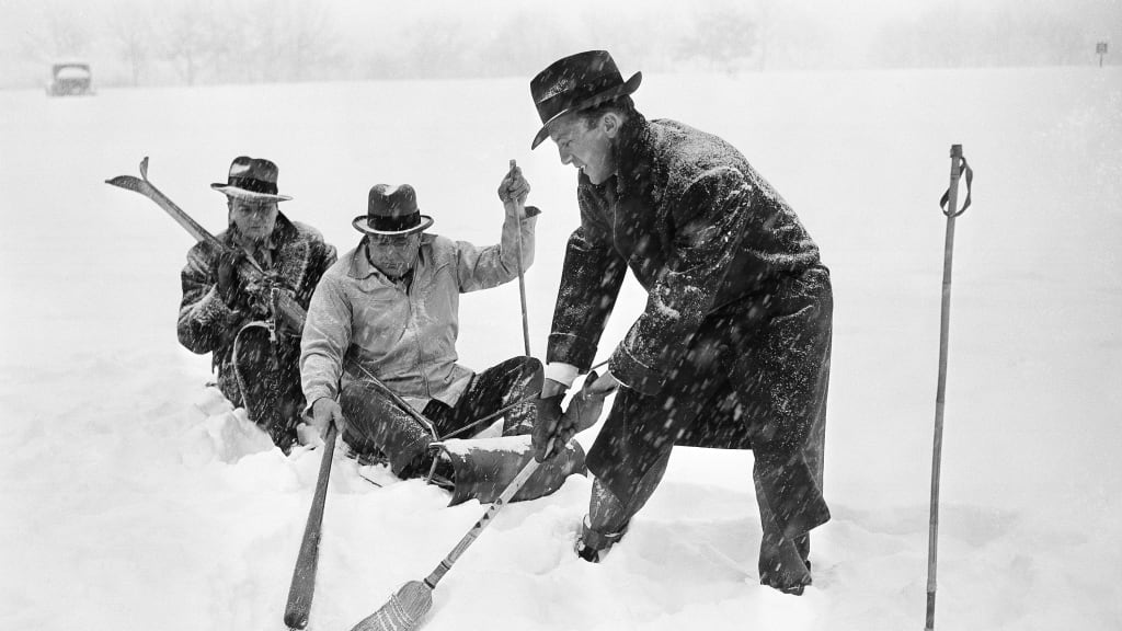 Dodgers president Branch Rickey (middle) tries to find home plate at New York's Bear Mountain State Park in 1943.