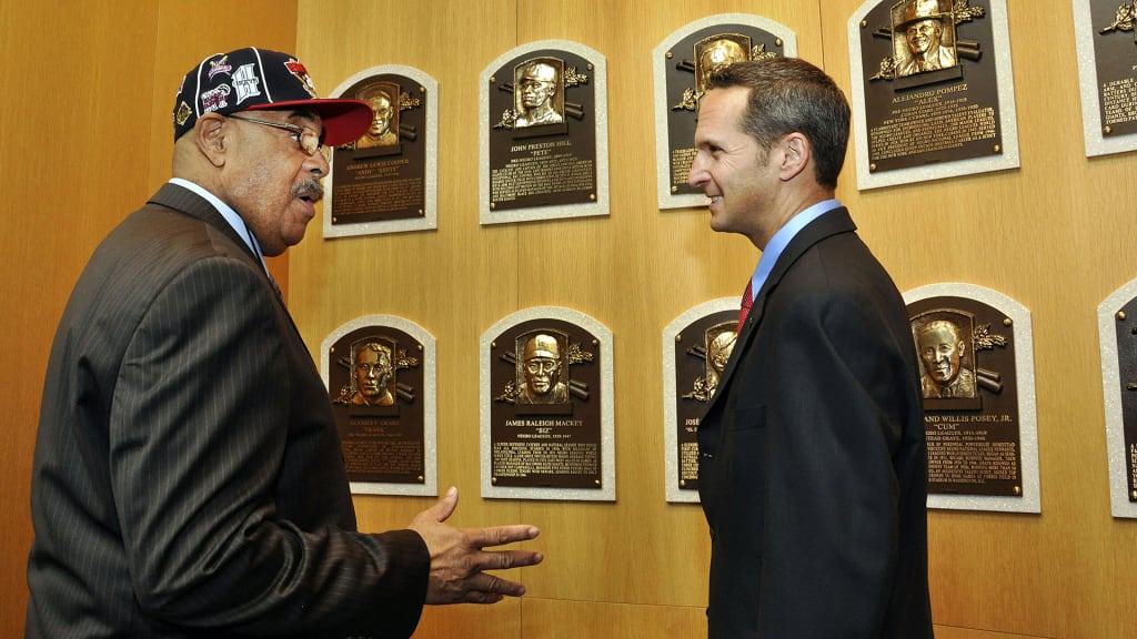 Ronald Hill, great nephew of Pete Hill, chats with National Baseball Hall of Fame and Museum former president Jeff Idelson during a plaque rededication ceremony in 2010.