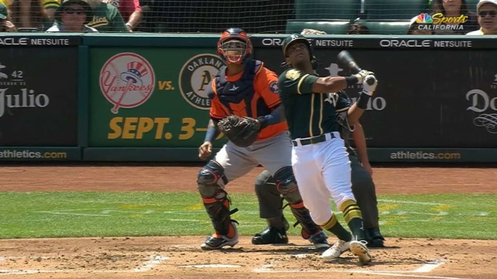 A's Khris Davis crushes home run while wearing jersey signed by