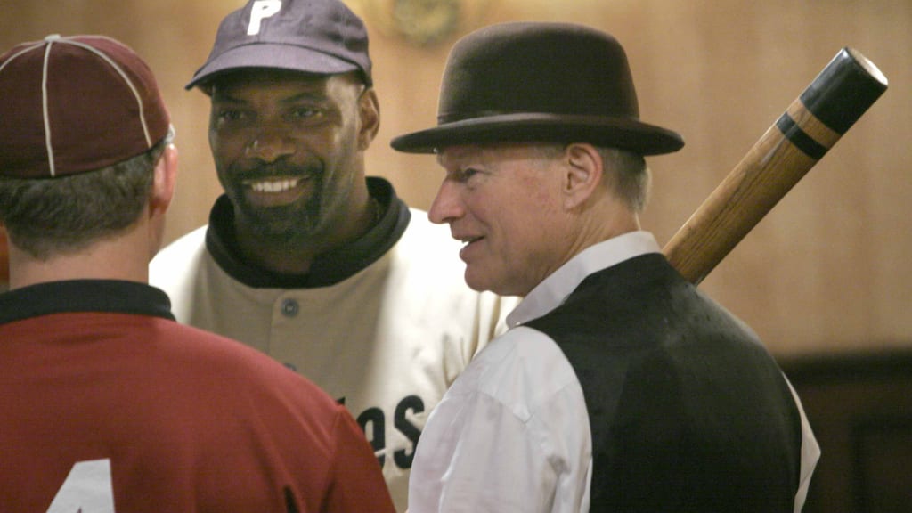 Bouton (right) in his role as chairman and CEO of the Vintage Base Ball Federation in 2006. (AP)