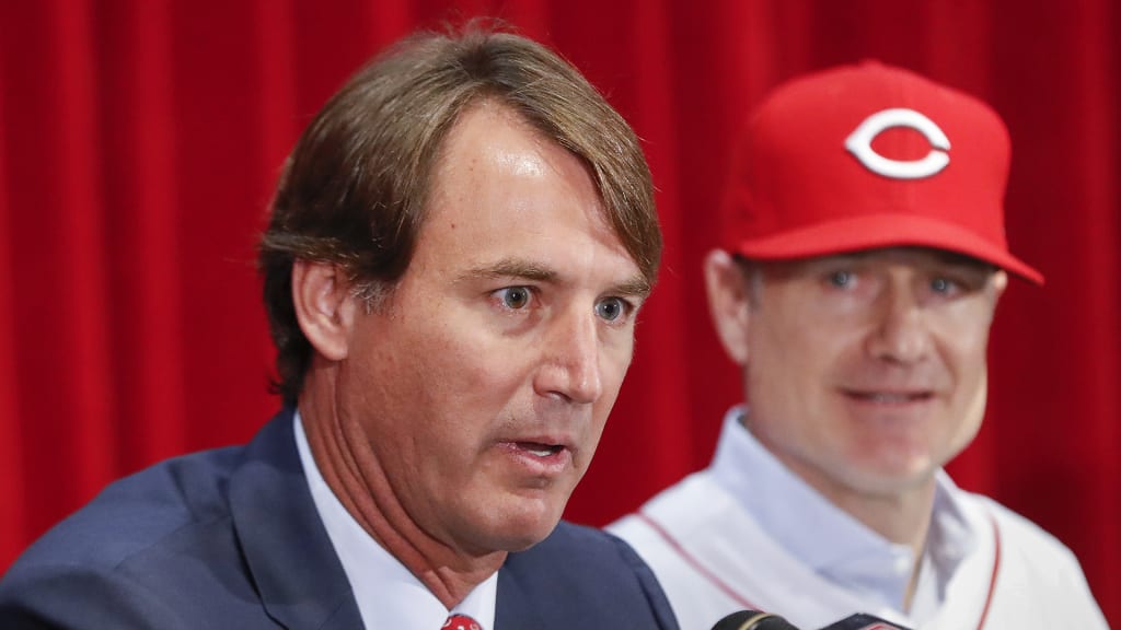 Dick Williams, president of baseball operations, left, speaks alongside Cincinnati Reds manager David Bell, right, Monday, Oct. 22, 2018, in Cincinnati. Bell has been hired as manager of the Cincinnati Reds, tasked with helping turn around a team that skidded to a 67-95 record and last-place finish in the NL Central. The Reds said Sunday, Oct. 21, 2018, he has been given a three-year contract that includes a team option for 2022. (AP Photo/John Minchillo)