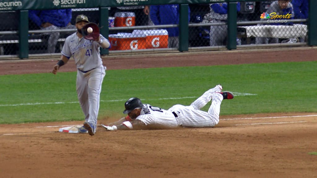 Moncada slides into first base