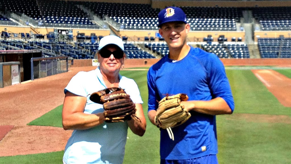 "It's pretty cool, playing catch with your mom still and throwing it as hard as you possibly can and she's catching it no problem," Mike Montgomery said of his mother, Jeannette. (Photo courtesy of Montgomery family)