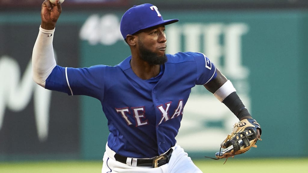 Texas Rangers' Jurickson Profar throws out Baltimore Orioles' Jonathan Villar during the third inning of a baseball game in Arlington, Texas, Saturday, Aug. 4, 2018. (AP Photo/Cooper Neill)