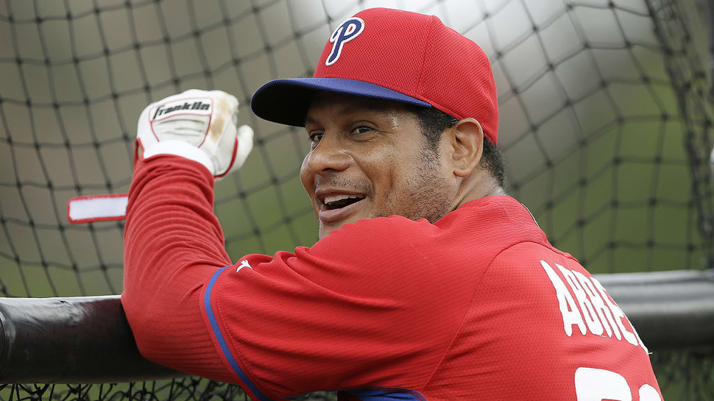 Philadelphia Phillies outfielder Bobby Abreu waits to hit in the batting cage during spring training baseball practice Monday, Feb. 24, 2014, in Clearwater, Fla. (AP Photo/Charlie Neibergall)