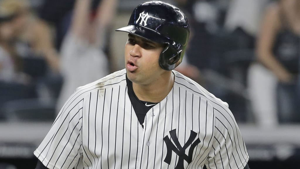 New York Yankees' Gary Sanchez reacts after hitting a two-run home run during the eighth inning of a baseball game against the Seattle Mariners at Yankee Stadium Wednesday, June 20, 2018, in New York. (AP Photo/Seth Wenig)