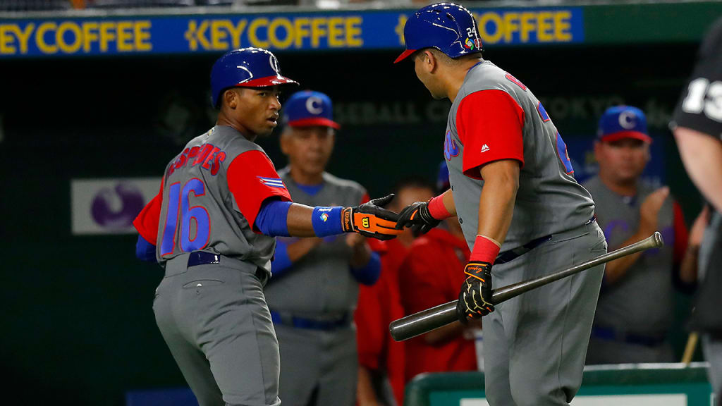 Yoelqui Cespedes (No. 16) went 3-for-4 in Cuba's opening-game loss to Japan on Tuesday. (Yuki Taguchi/WBCI/MLB Photos)