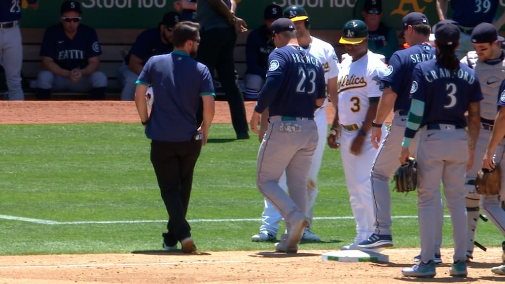 Mariners' Ty France leaves game against A's after collision