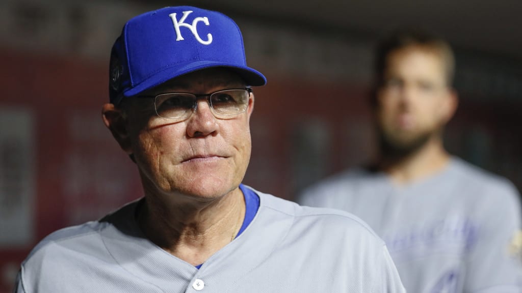 Kansas City Royals manager Ned Yost stands in the dugout during the fourth inning of the team's baseball game against the Cincinnati Reds, Tuesday, Sept. 25, 2018, in Cincinnati. (AP Photo/John Minchillo)