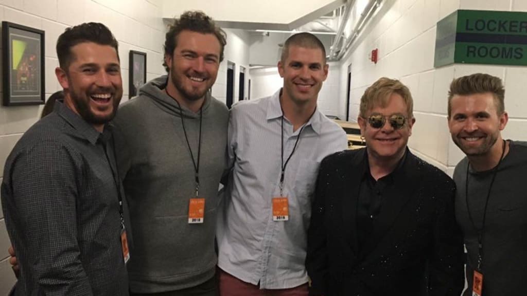 Trevor Plouffe, Phil Hughes, Joe Mauer and Brian Dozier meet Elton John. (Phil Hughes photo)