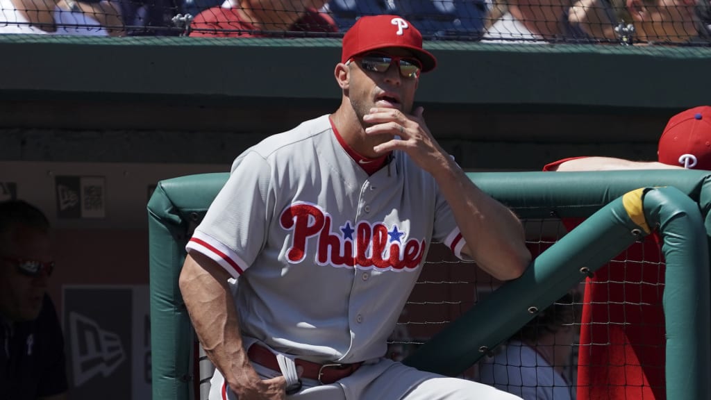 Philadelphia Phillies manager Gabe Kapler stands in the dugout during a baseball game against the Washington Nationals at Nationals Park Thursday, Aug. 23, 2018, in Washington. The Phillies won 2-0. (AP Photo/Andrew Harnik)