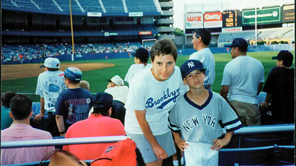 Ottavino and his mom attending a Yankees game.