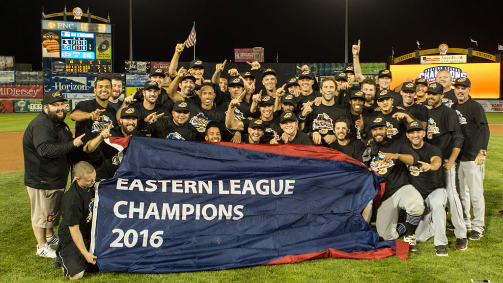 The Akron RubberDucks celebrate after beating Trenton to capture the Eastern League title (David Monseur/MiLB).