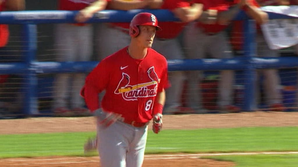 JUPITER, FL - MARCH 20: St. Louis Cardinals non-roster invitee infielder  Jose Rondon (64) scores a run after being batted in by St. Louis Cardinals  outfielder Lane Thomas (not shown) during an