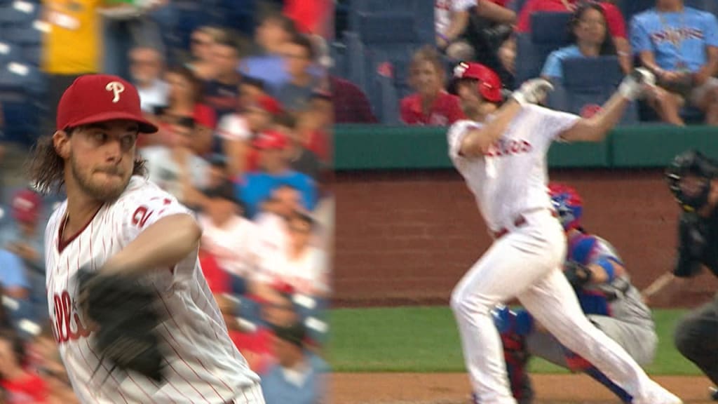 Bryce Harper gives Charlie Manuel water after homers