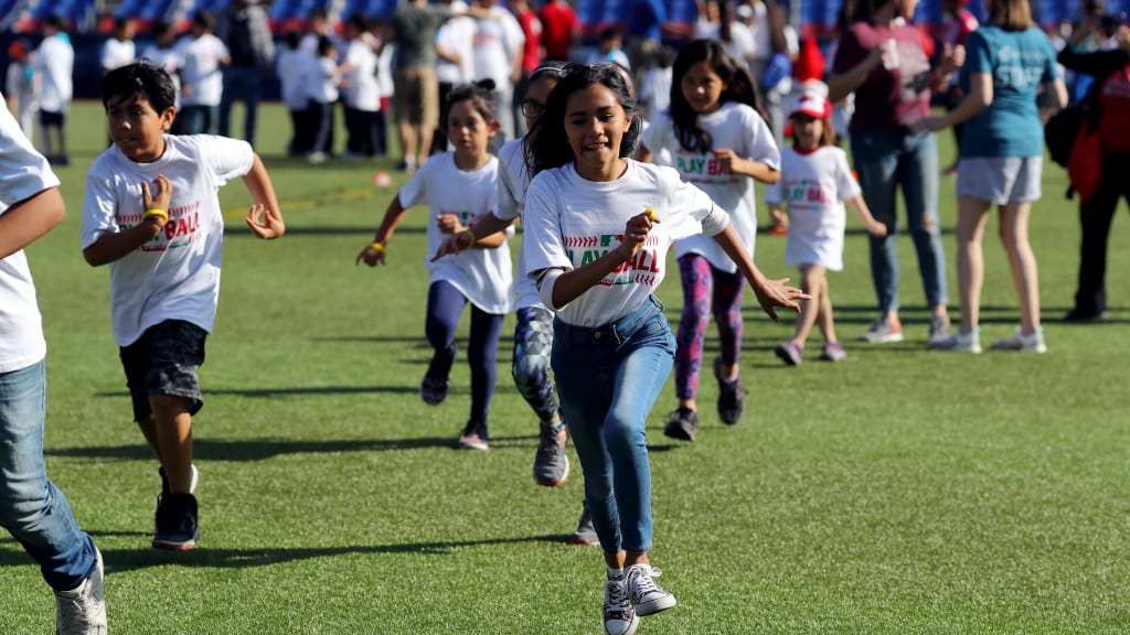 Play Ball participants having fun at the Estadio de Beisbol de Monterrey. (Credit: MLB Photos)