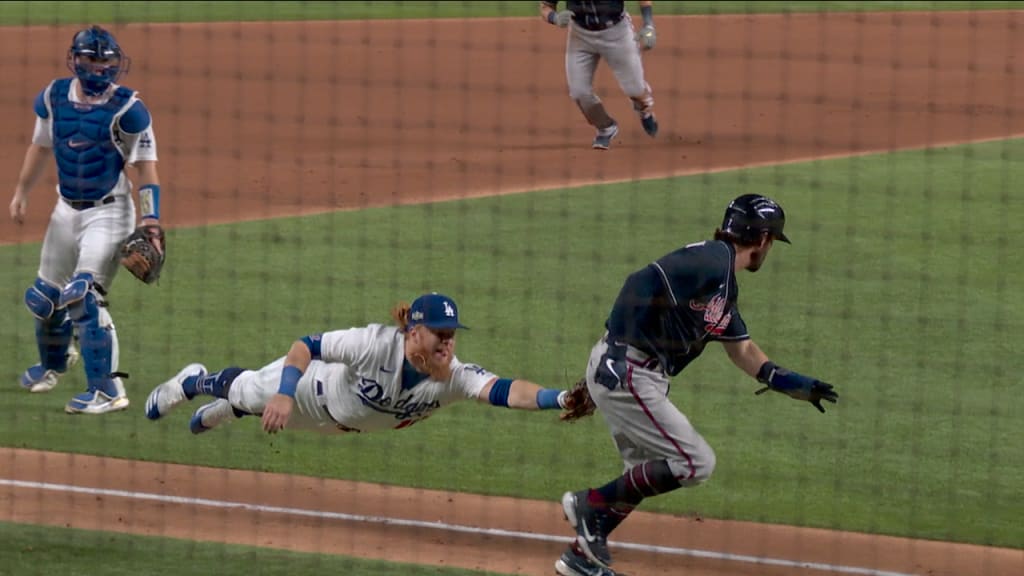 Be inspired by this fan's gigantic Dodger Blue mohawk at NLCS Game