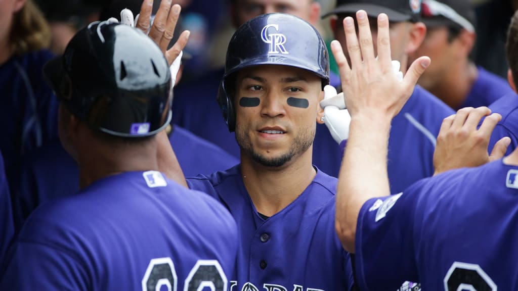 Carlos Gonzalez is one of five outfielders on the Rockies' 25-man roster. (AP)