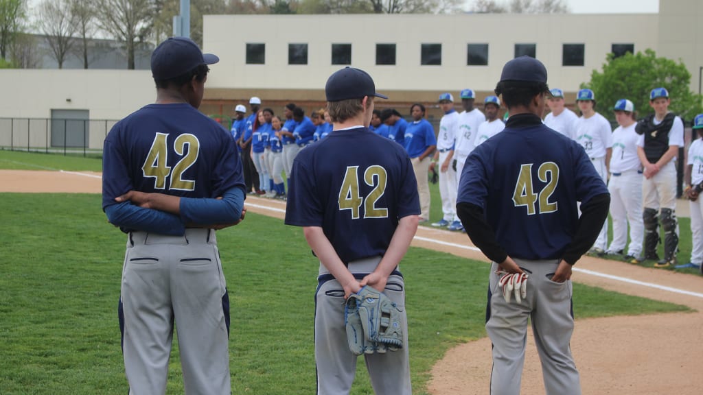 All 12 teams playing at the Reds Youth Academy on April 13 for the Jackie Robinson Day games wore custom '42' jerseys, mirroring the tribute Major League Baseball has exhibited for Robinson since 2009.