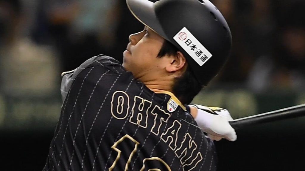 Shohei Ohtani gives a glimpse of his power at the plate & over the