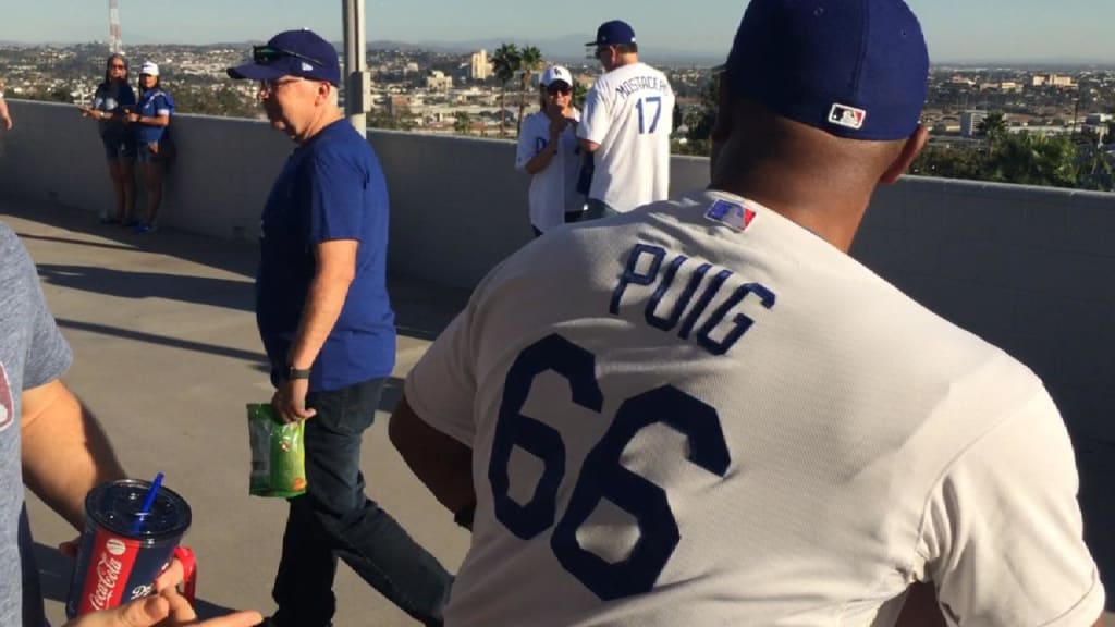 Puig gives a special Dodger fan the shirt off his back