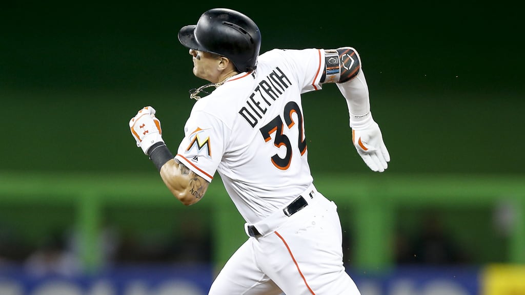 MIAMI, FL - SEPTEMBER 03: Derek Dietrich #32 of the Miami Marlins rounds second base after hitting a triple in the second inning against the Philadelphia Phillies at Marlins Park on September 3, 2018 in Miami, Florida. (Photo by Michael Reaves/Getty Images)