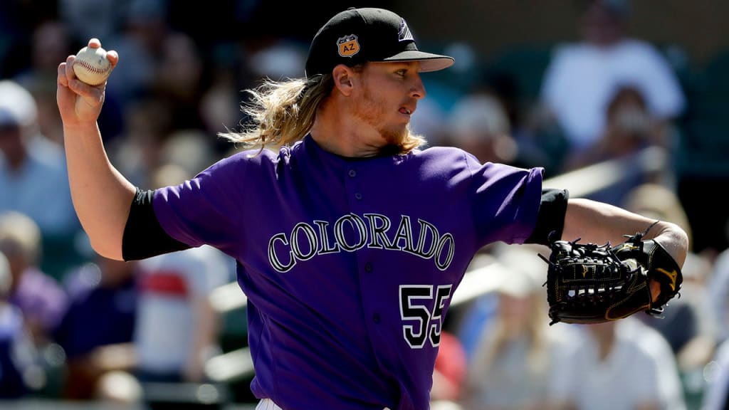 Jon Gray used a curve to help strike out 7 in 5 innings. (AP)