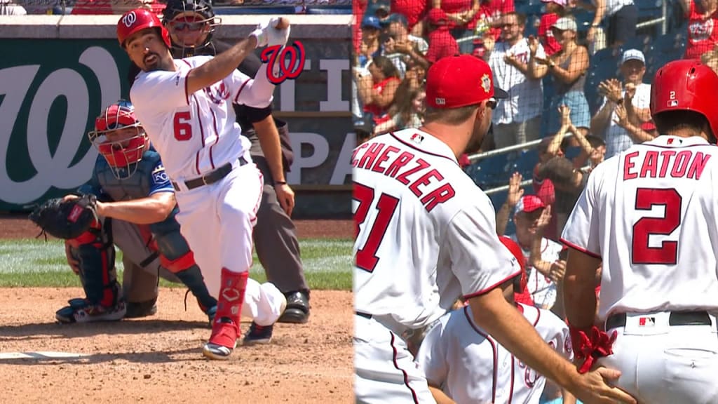 Washington Nationals' Brian Dozier and Adam Eaton celebrate after