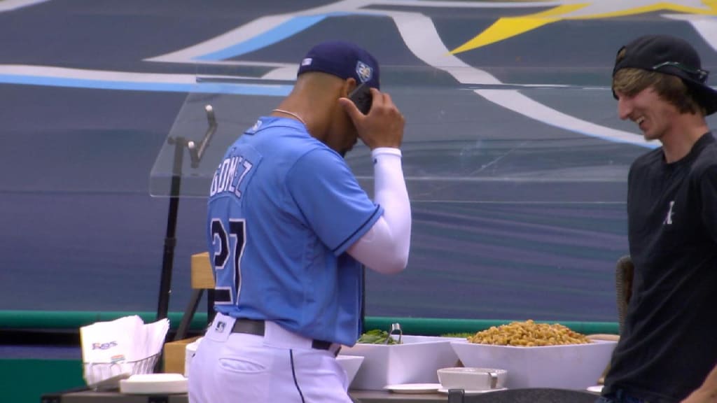 Rays' Carlos Gomez reportedly tosses ball with a phone number on it to female  fan at Yankee Stadium 