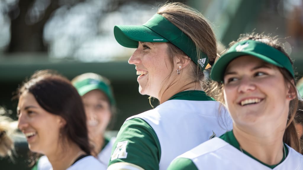 Corrick laughing with her teammates. (Photo courtesy USF Athletics)