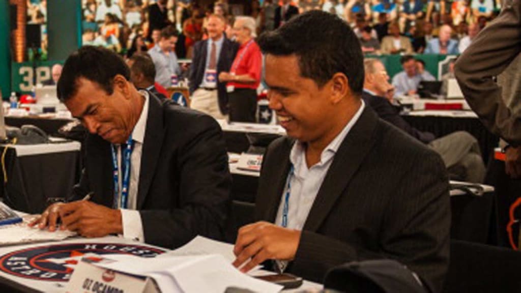 Oz Ocampo, right, the Astros' director of international scouting, loves the club's international signings, especially 6-foot-7 right-hander Heitor Tokar, a 16-year-old. (Getty)